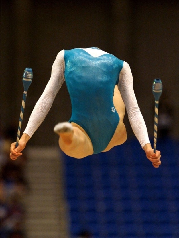 20. This gymnast didn't lose her head in a freak accident: in fact, in the middle of the jump a picture was taken and her head was bent backwards.