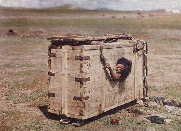 6.) Starving Mongolian Woman: This was published in National Geographic in 1913 by Stefan Passe. Mongolia was newly independent. A common punishment for criminals was being placed in a box like this in public... possibly until starvation.