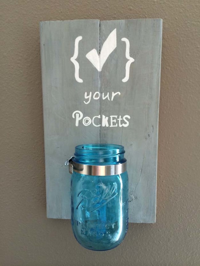 Keep a jar in the laundry room for loose pocket change, and attach it to a sign that reminds people to check their pockets before throwing in a load of clothes.