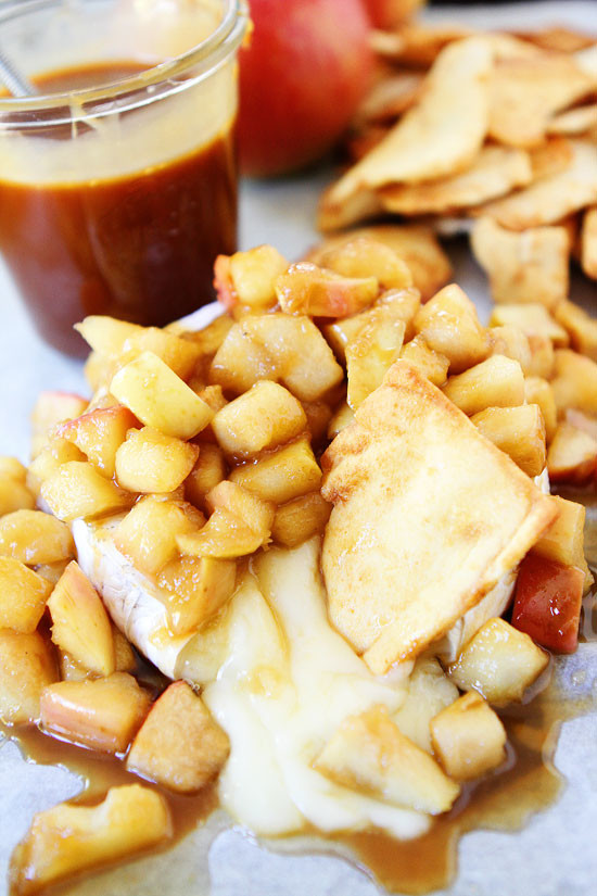 Salted caramel apples atop some ooey-gooey cheese: