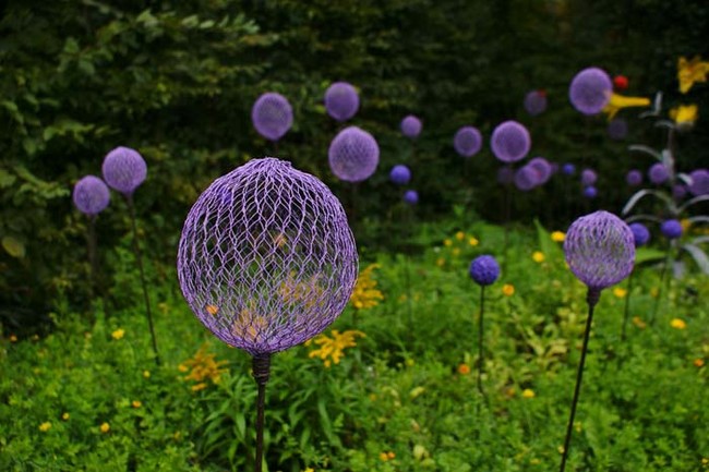 Chicken wire and spray paint create these cool garden decorations.
