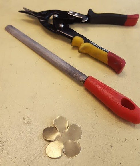 A file helped to smooth out the rougher edges after he was done with the clippers.