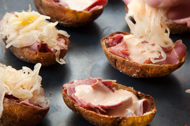 Making Reuben sandwiches for an entire party would be near impossible, but Reuben potato skins? That's totally doable!