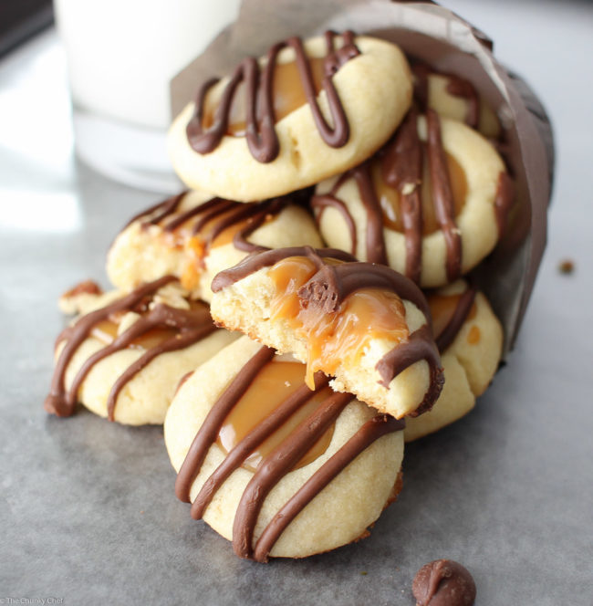 Drizzle a layer of melted chocolate over these thumbprint cookies to give them a decorative touch.