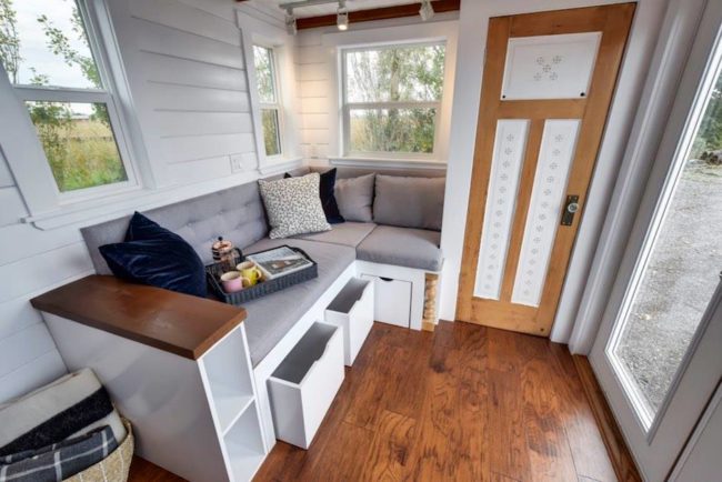 Just look at all the natural light coming into this home, not to mention the cozy furniture!