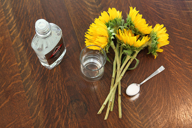 Your flowers will stay fresher longer in the vase if you get 'em a little drunk.