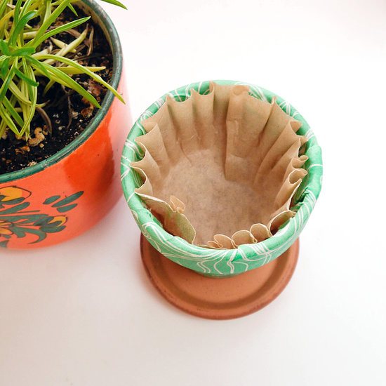 Coffee filters will stop soil from leaking through your pots' drainage holes.