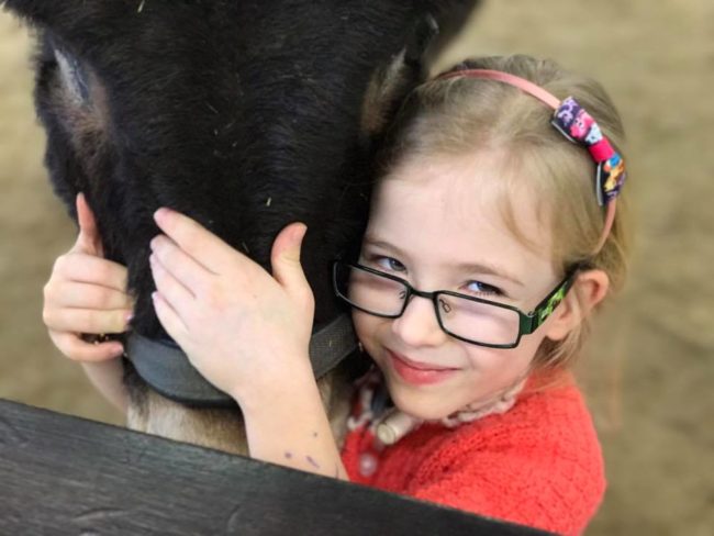 Amber has cerebral palsy and also had to have a life-saving surgery that cut off airflow to her vocal cords. That left her unable to speak, but Shocks was there to help her gain confidence.