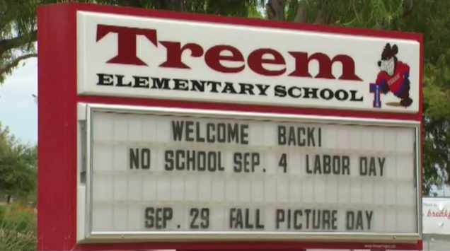 Well, people at Harriet Treem Elementary school didn't seem to think so, because they pulled the girl out of class, took her to the office, and made her wear gym clothes over the dress.