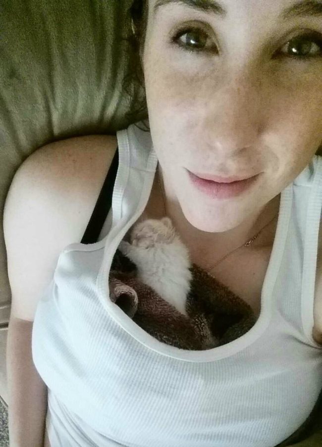 The easiest way to get Ollie to eat was to wrap him up in a blanket and place him close to her heart.