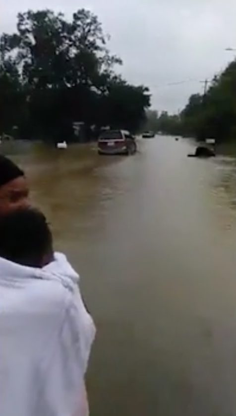 The water in her family's home was up to her chest, and they had to evacuate to their roof. Tyler had just a towel to protect her, but it got wet.
