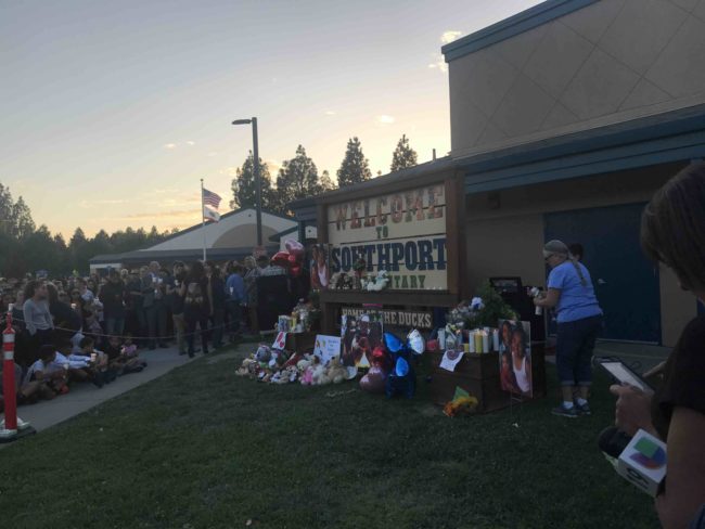 Southport Elementary School, where the two oldest children attended, held a candlelight vigil in their honor. They've also offered counseling services to students who need it following the brutal murders.