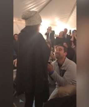 Inside the tent, Rios got down on one knee and proposed in front of their loved ones.
